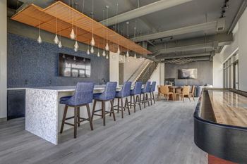 7Th floor clubroom w/ shuffleboard & poker table